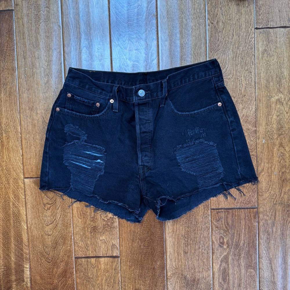 Levi’s black distressed mid rise shorts